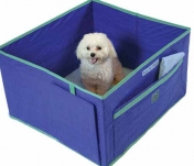 Dog inside indoor dog potty Pack 'N Piddle
